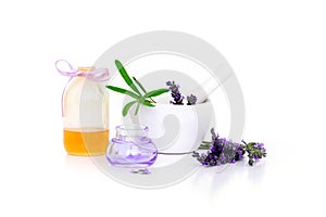 Lavender flowers, lavander extract, oil and montar with dry flowers isolated on white