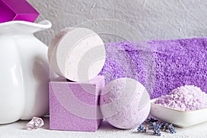 Lavender flowers, lavender soap, aromatic sea salt, lavender shampoo and towels. Concept for spa, beauty and health salon,