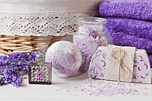 Lavender flowers, soap, aromatic sea salt and towels. Concept for spa, beauty and health salon, cosmetics store. Natural cosmetics