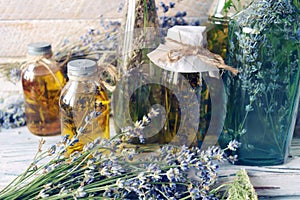 Lavender flowers, tincture bottles and lavender oil jars