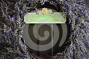 Lavender flowers with welcome friends sign