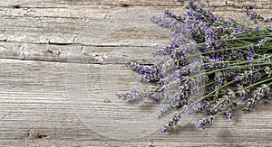 Lavender flowers on wooden background. Vintage still life