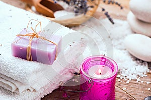 Lavender handmade soap bars, candel on wooden background