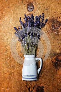 Lavender herbs in a blue vase.
