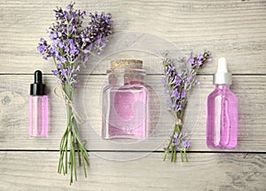 Lavender  oil spa composition. Aromatherapy concept. Fresh flowers fragrance top view. Homemade cosmetics