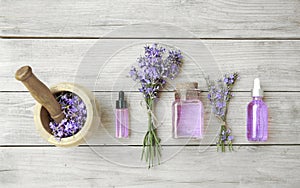 Lavender oil spa composition. Aromatherapy concept. Fresh flowers fragrance top view. Homemade cosmetics