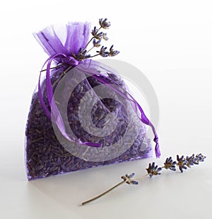 Lavender sachet with dried lavender buds isolated on white
