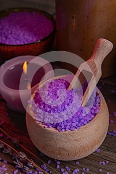 Lavender salt and scented candle for the bathroom, for spa and relaxation in a rural cottage interior