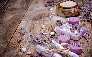 lavender soap, scented salt and spa stones - spa concept