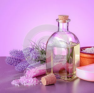 Lavender spa products with natural oil, soap, sea salt and lavender flowers