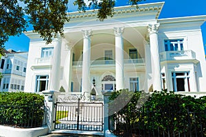 Lavish white greek revival style house with full length Corinthian columns