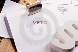 Law act with red veto stamp.