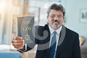 Law, book and portrait of a man or lawyer with a book, constitution or research with legal books, study and knowledge