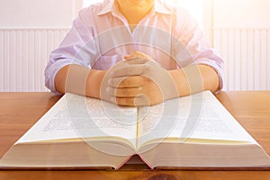 Law books lying open on table in lawyer office are legal books containing legal statutes and court judgments to be used in arguing photo