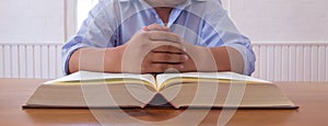 Law books lying open on table in lawyer office are legal books containing legal statutes and court judgments to be used in arguing photo