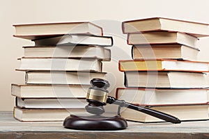 Law concept . Books with wooden judge gavel on table in a courtroom or enforcement office.