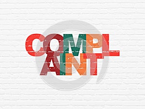 Law concept: Complaint on wall background