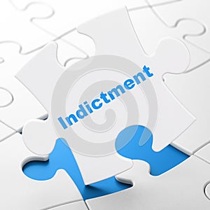 Law concept: Indictment on puzzle background