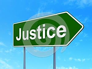 Law concept: Justice on road sign background