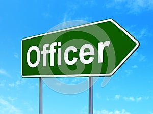 Law concept: Officer on road sign background