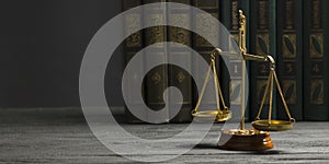 Law concept - Open law book with a wooden judges gavel on table in a courtroom or law enforcement office isolated on photo