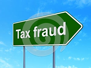 Law concept: Tax Fraud on road sign background