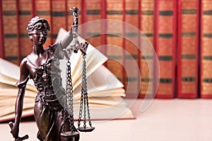 Law concept - Wooden judges gavel and book on table in a courtroom or law enforcement office. Copy space for text.