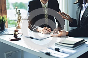 Law, Consultation, Agreement, Contract, Attorney or Lawyer holding a pen is consulting with a client to explain the