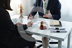 Law, Consultation, Agreement, Contract, Attorney or Lawyer holding a pen is consulting with a client to explain the