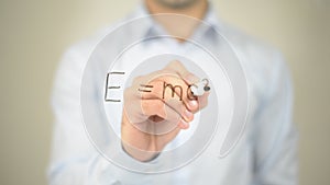 Law of Equivalence of Energy and Mass, Man writing on transparent screen photo