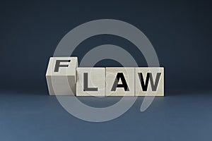 Law or Flaw. Cubes form the words Law or Flaw