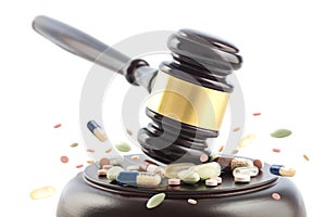 Law gavel beats on tablets and pills, judge cocept, crime with