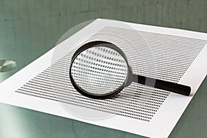 Law investigation, magnifying glass with document