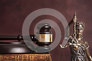 Law and judgment concept. Figure of Lady Justice in notary office close-up.