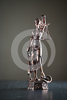 Law and Justice concept image, Lady Justice and gavel  on rustic books background