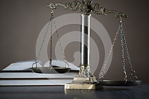 Law and Justice concept image, Lady Justice and gavel  on rustic books background