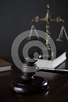 Law and Justice concept image, Lady Justice and gavel  on rustic books background