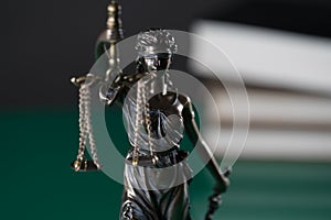 Law and Justice concept image, Lady Justice and gavel  on rustic books background