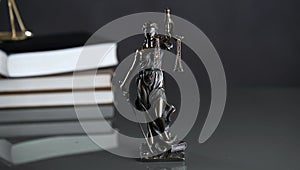 Law and Justice concept image, Lady Justice and gavel  on rustic books background