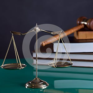 Law and Justice concept image, Lady Justice and gavel  on rustic books background