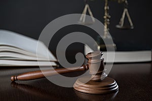 Law and Justice concept image, Lady Justice and gavel  on rustic books background