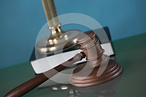 Law and Justice concept image, Lady Justice and gavel  on rustic books background