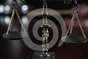 Law and Justice concept image, Lady Justice and gavel  on rustic books background