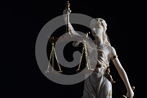 Law and Justice concept image, Lady Justice and gavel  on rustic books background