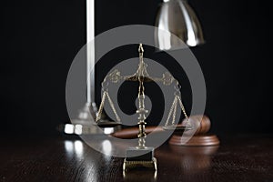 Law and Justice concept image, Lady Justice and gavel  on rustic books background