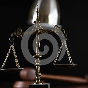 Law and Justice concept image, Lady Justice and gavel  on rustic books background