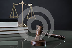 Law and Justice concept image, Lady Justice and gavel  on rustic books background