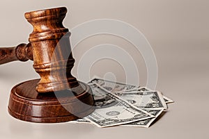 Law mallet and a stack of money