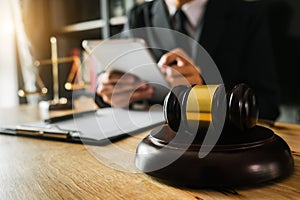 Law theme wooden desk, books, balance. Law concept.