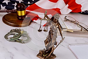 Law United States of America, statue of Lady Justice with file justice documents folder United States of America Flag